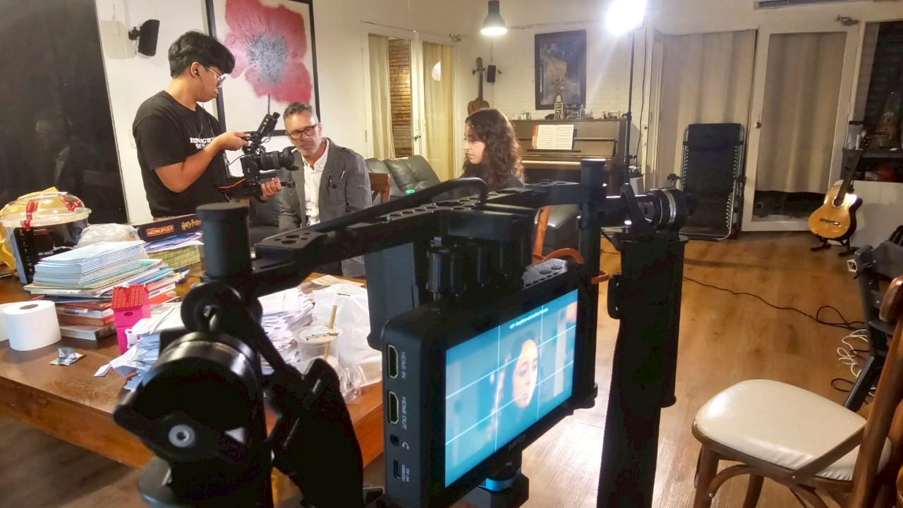 Professional Thailand film set with actors and crew in sync, showcasing reliability.  

